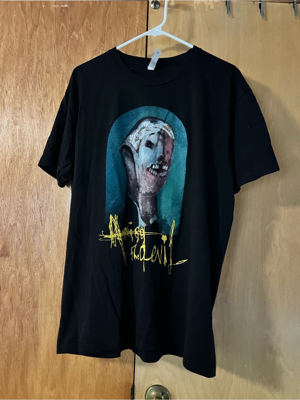 Black Graphic Men’s T-Shirt with Surreal Portrait Print